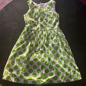 Green and white polka dot dress